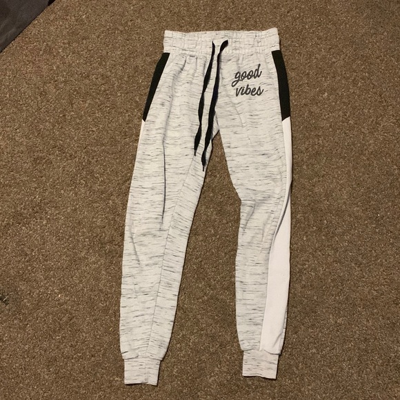 light grey sweat pants, says “Good Vibes” on the front. (most likely for a teen) - Picture 1 of 3